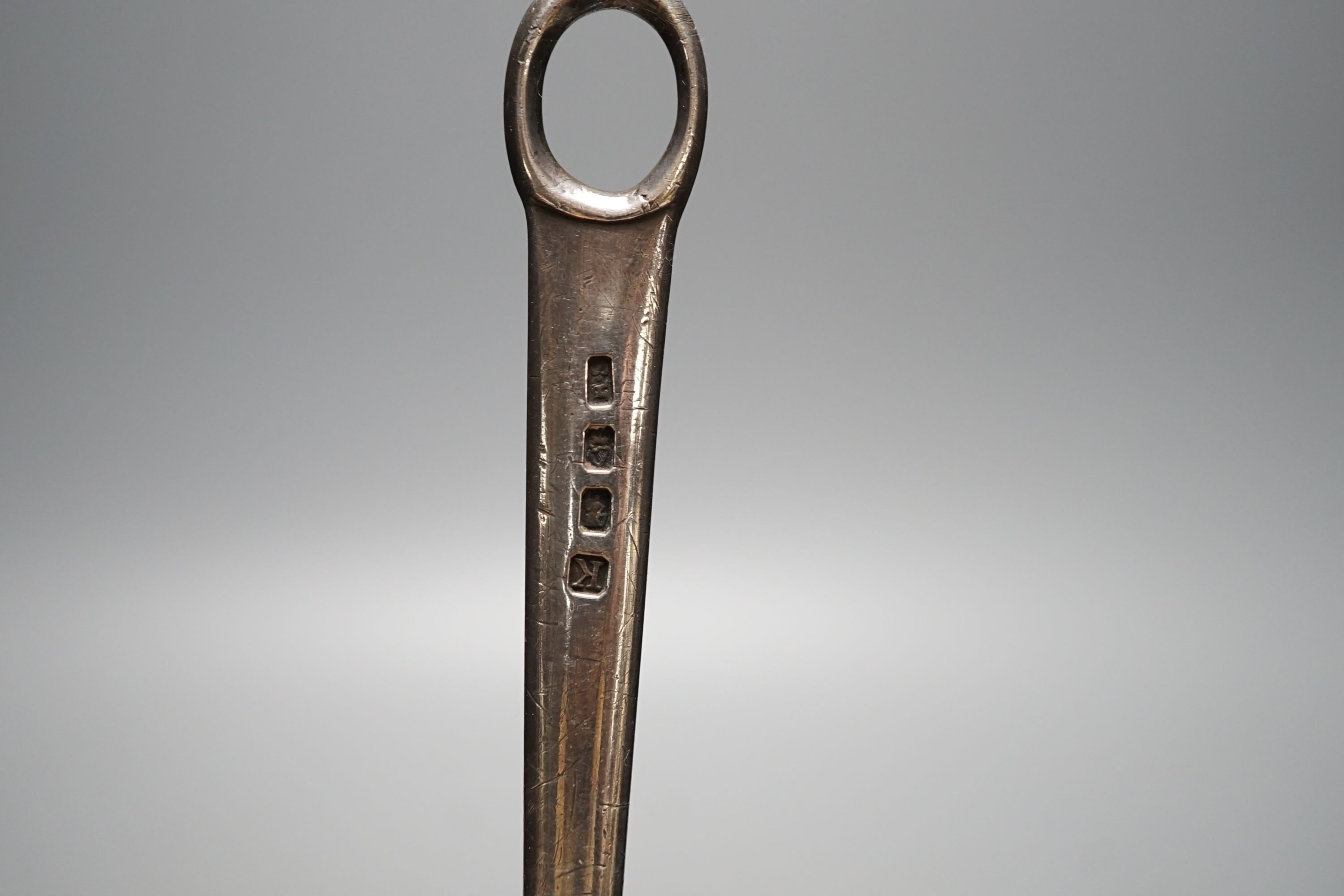 A George III Irish silver meat skewer, Richard Sawyer, Dublin, 1806, 19.4cm and a George V Irish silver vesta case.